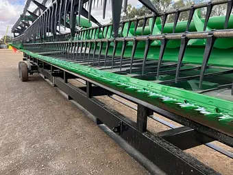 John Deere 740D 40ft flex draper front — full length view from front