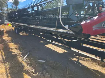 MacDon D60 40ft — full length on comb trailer in HFR yard
