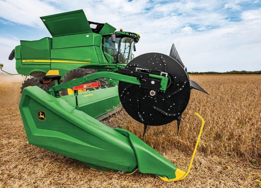 John Deere combine harvester in the paddock — the type of machine whose header front comes through the HFR workshop for structural repair and refurbishment